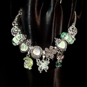 Elegant Silver and Green Charm Bracelet